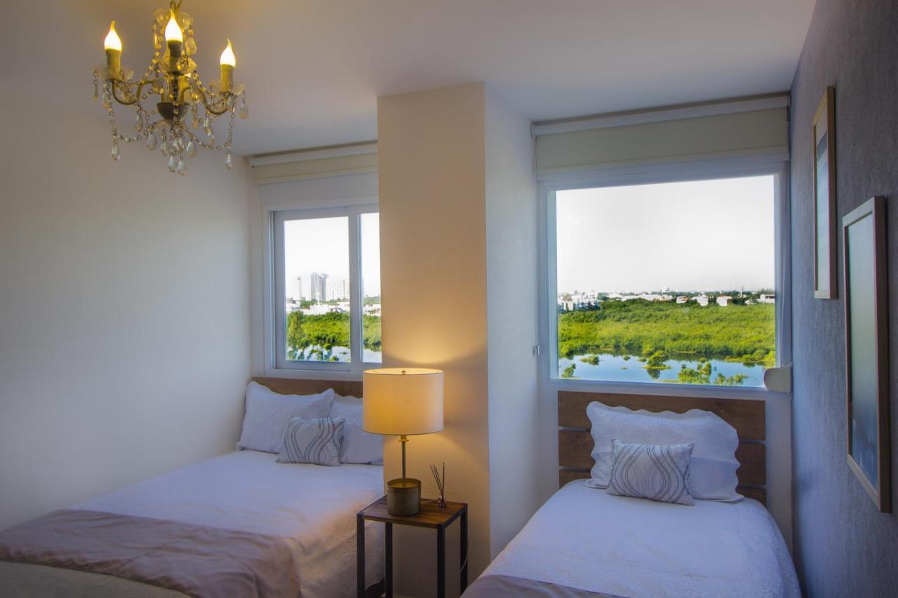 Tu Hogar Frente Al Mar Caribe, Vive Cancún Buitenkant foto
